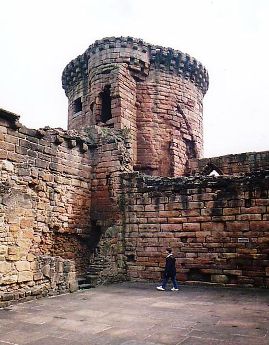 Featured is a photo of the tower at Bothwell Castle on the River Clyde about 10 miles from Glasgow.  The castle, built in the 1200s, figured prominently (and often as a pawn) during the Scottish Wars for Independence. It is in the process (ongoing) of being restored.  Photo by Dave Souza.